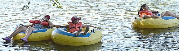 kids tube on river
