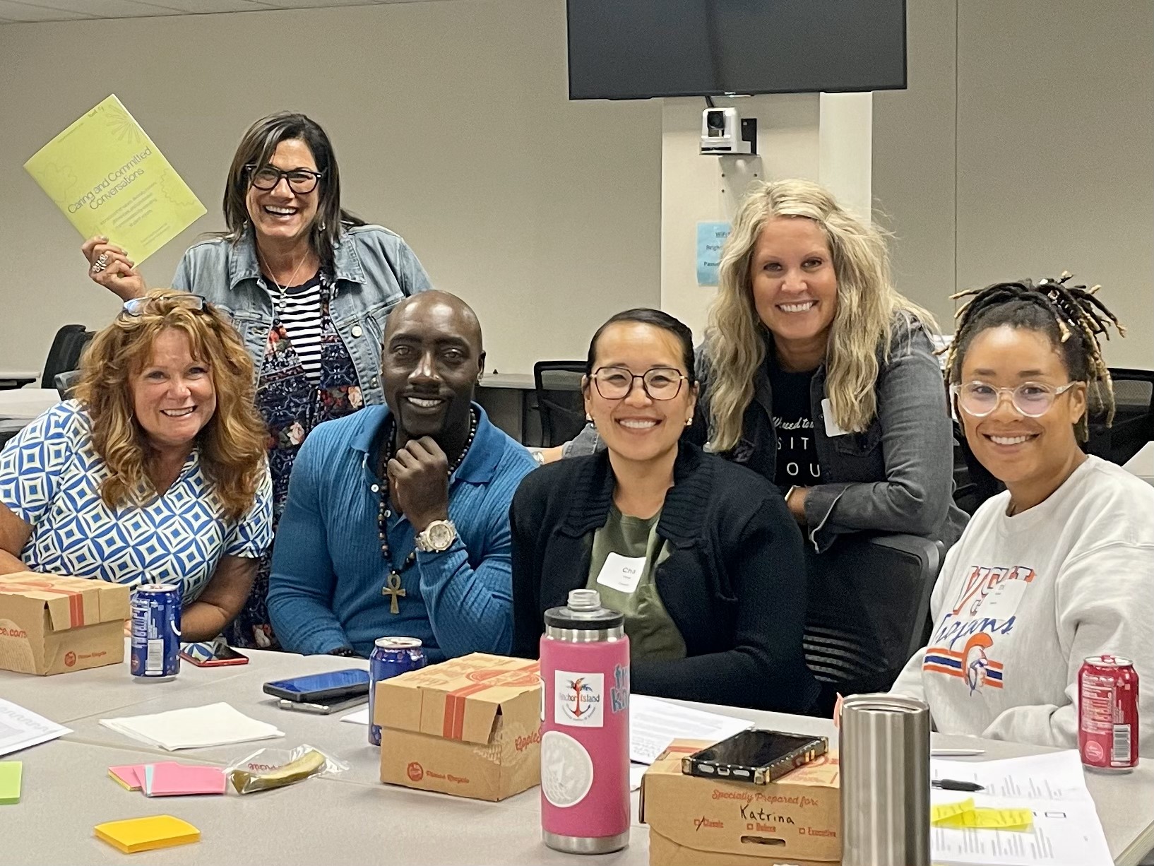 Six people at a professional development event.