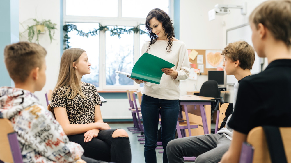 School nurse talking with students