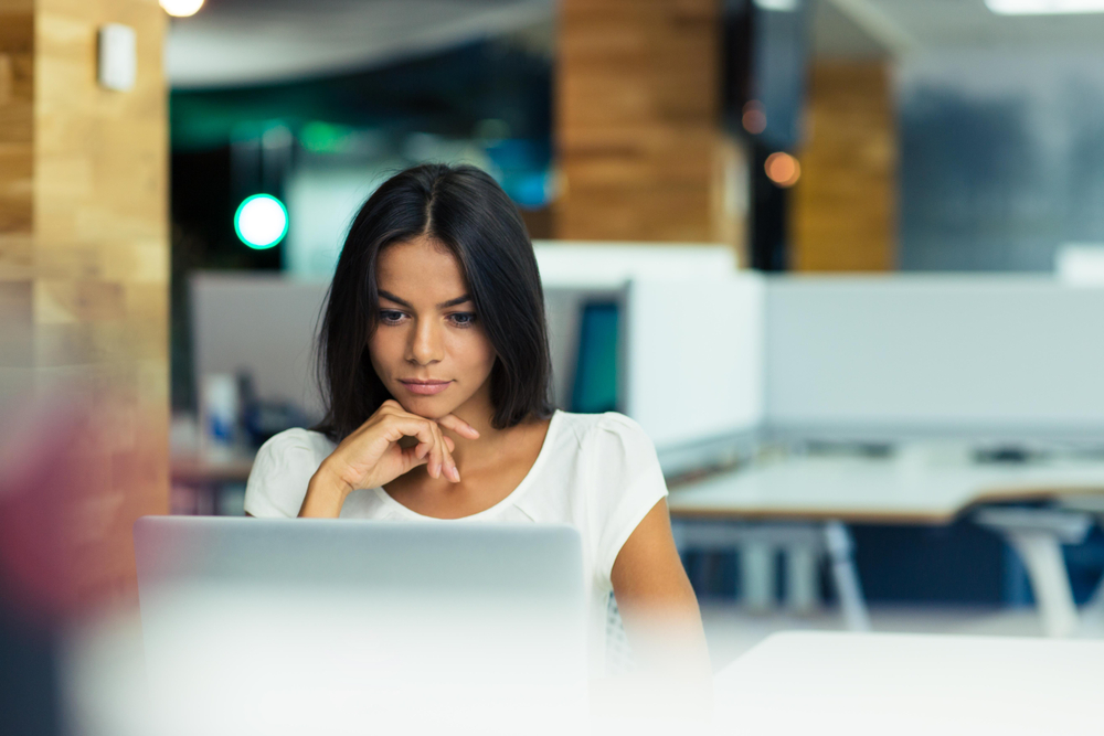 Woman taking a test on a computer.