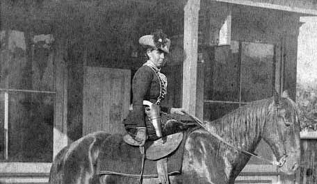Belle Starr side saddle on a horse in Arkansas