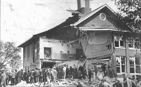 Residents pitch in to find survivors after school board member Andrew Kehoe dynamited the Bath Michigan Consolidated School on May 18, 1927. A.P. Photo (Detroit News)