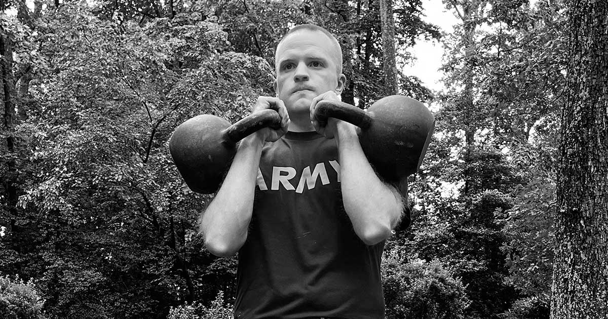 Dr. Moseley performing the kettlebell bent press