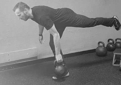 Derek performing the single leg kettlebell deadlift