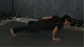 Yoana Teran demonstrating the one-arm pushup