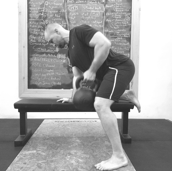 Jose Luis Cortina performing the kettlebell row