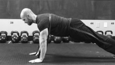 Jody Beasley performing a band-resisted pushup