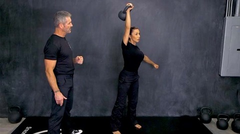 The kettlebell military press teached in the StrongFirst Kettlebell Fundamentals Course 