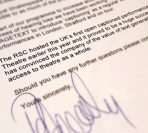 Close up of letter from RSC booking in captioned performances