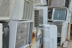 A photo of rusing and neglected air conditioning and ventilation units