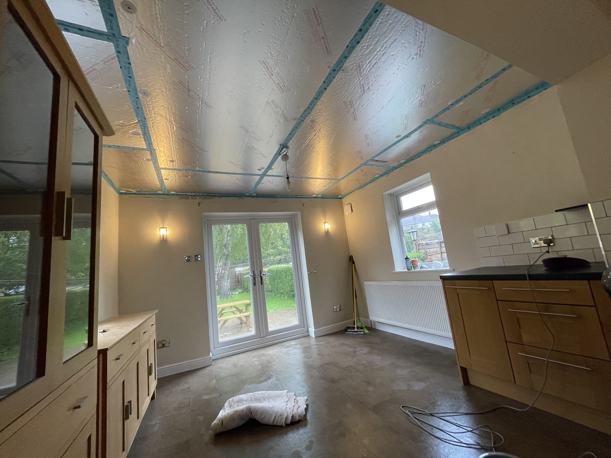 Photo of a home retrofit project with ceiling insulation