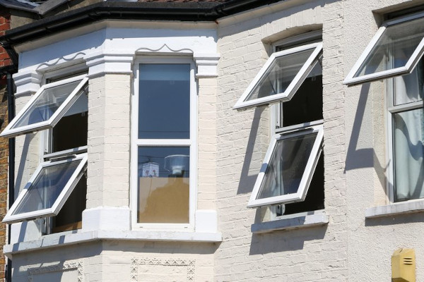 A photo of home with all the of the windows open