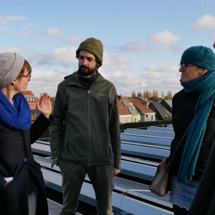 photo of carbon co-op staff at a Belgian rooftop solar site