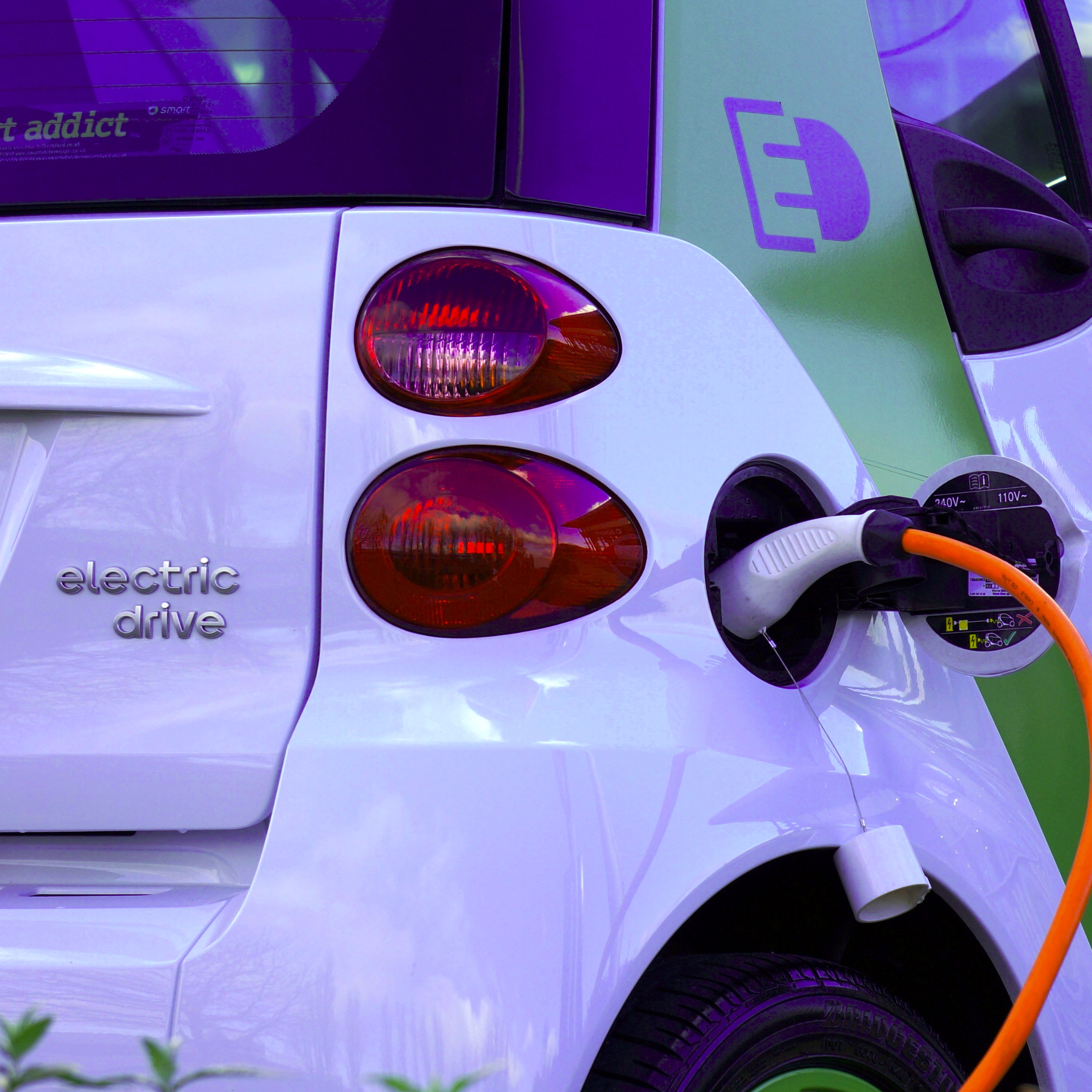 photo of an electric car charging