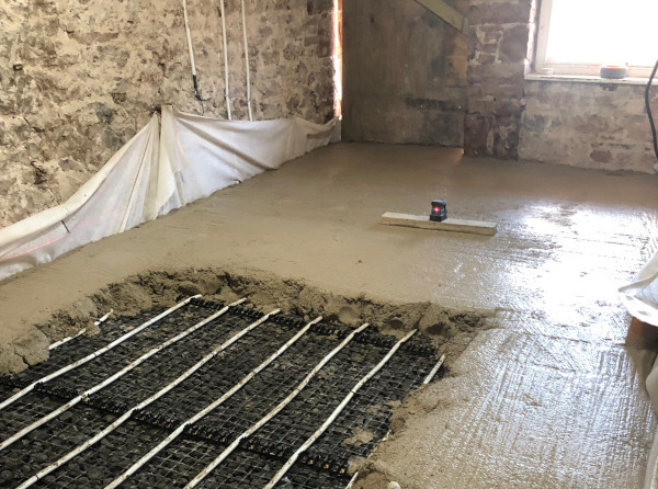 A photo of a floor being layed