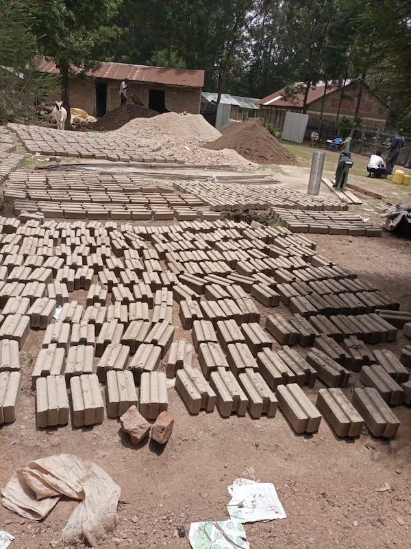 pressing bricks in kambiri