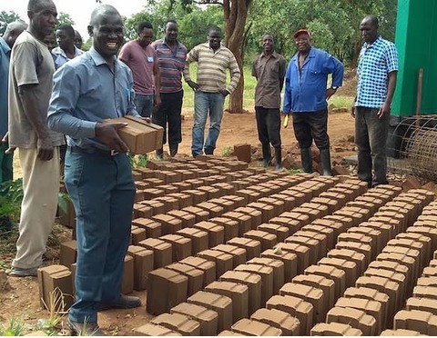eric holding brick