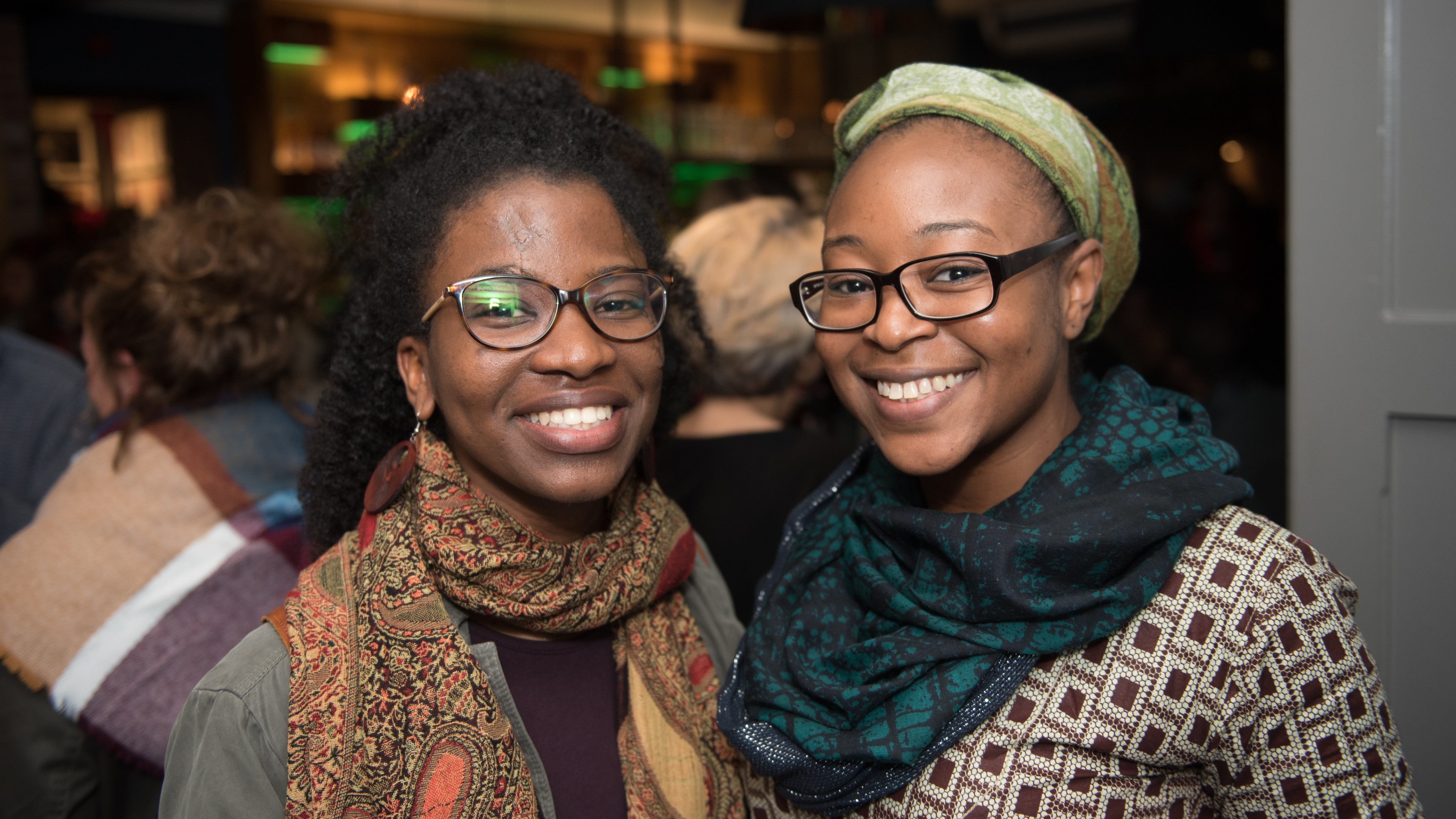 Smiling women for the Cambridge African Film Festival