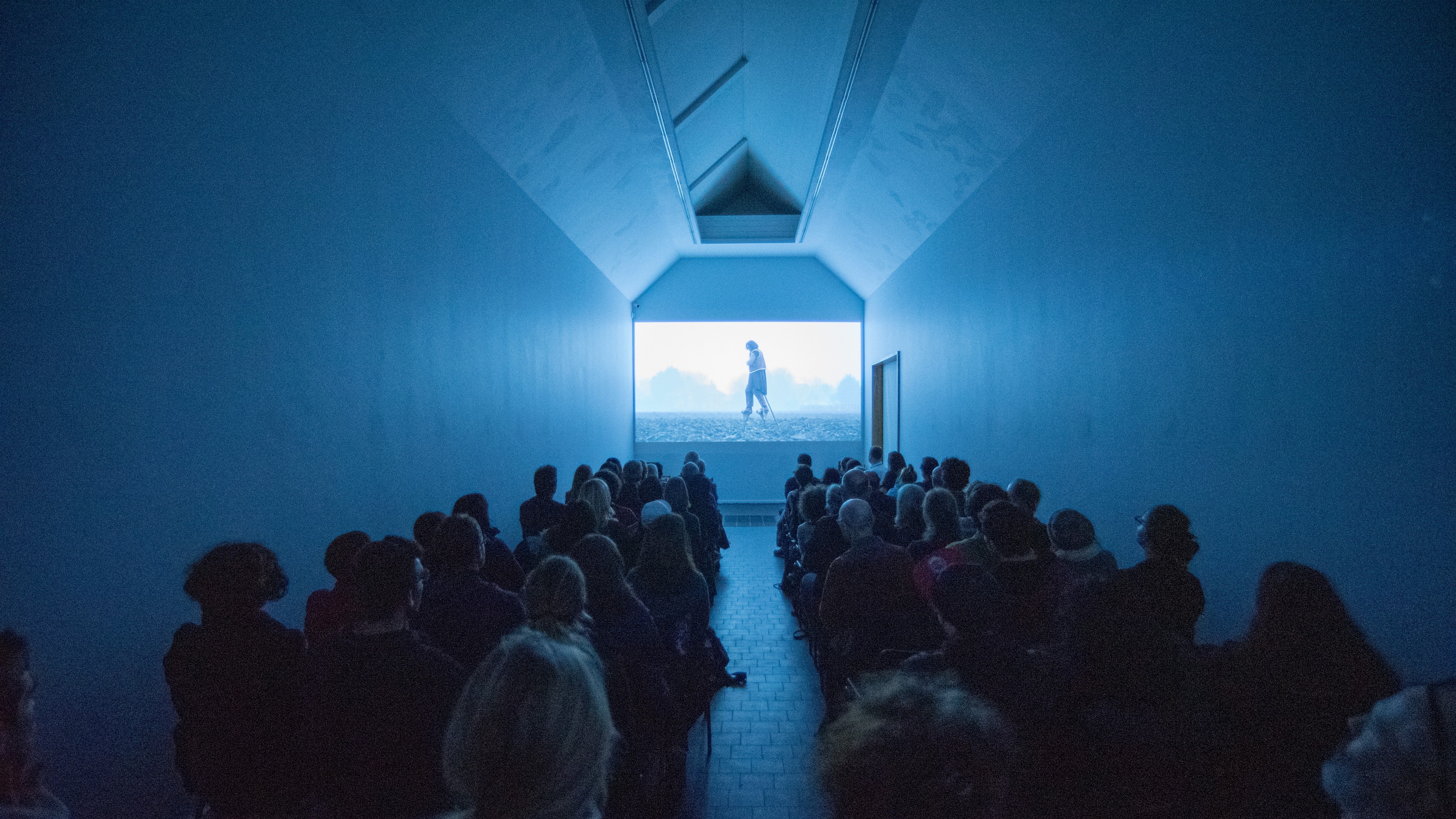 blue room with film projected