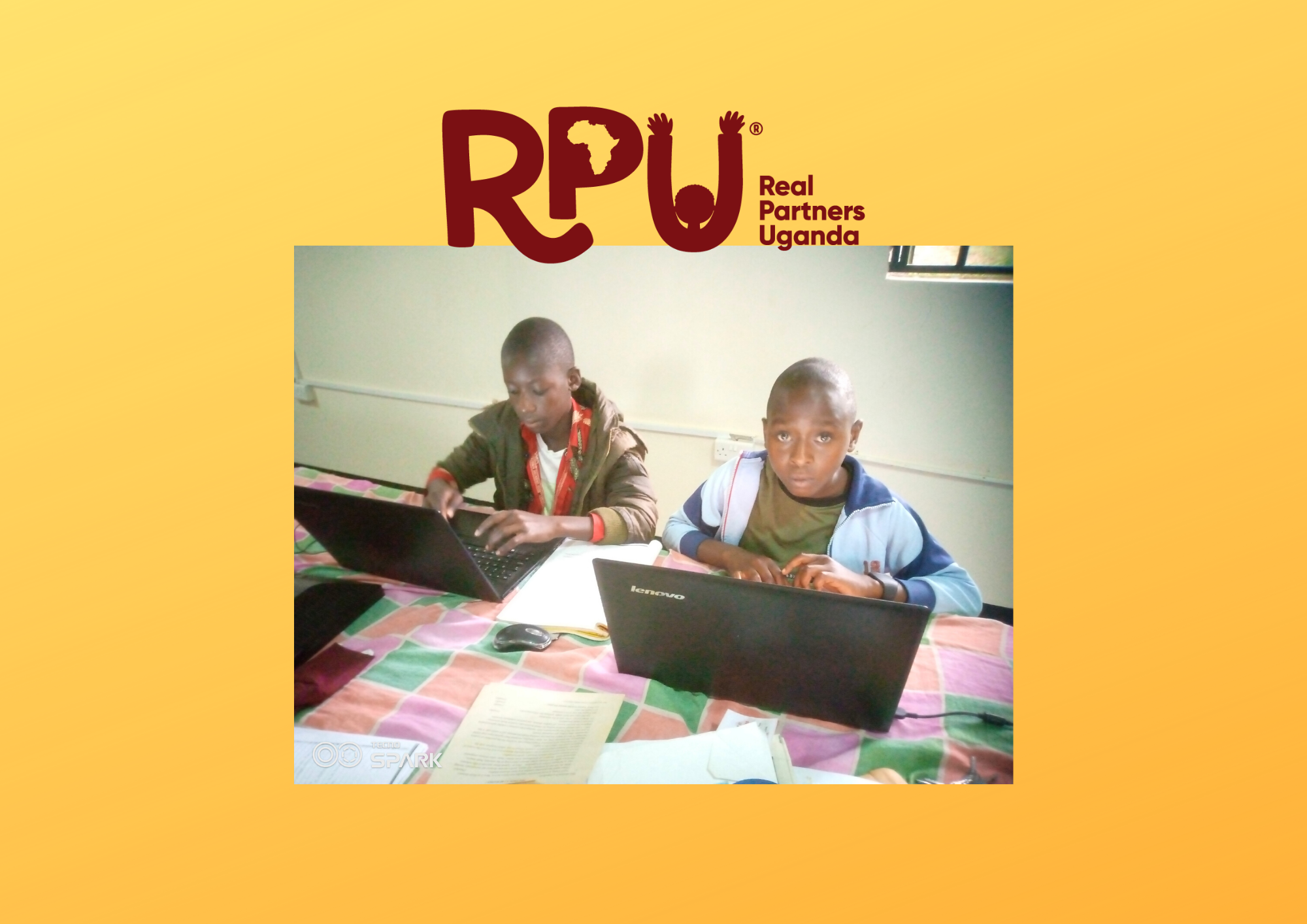 Two students working on laptops in computer lab at MSA