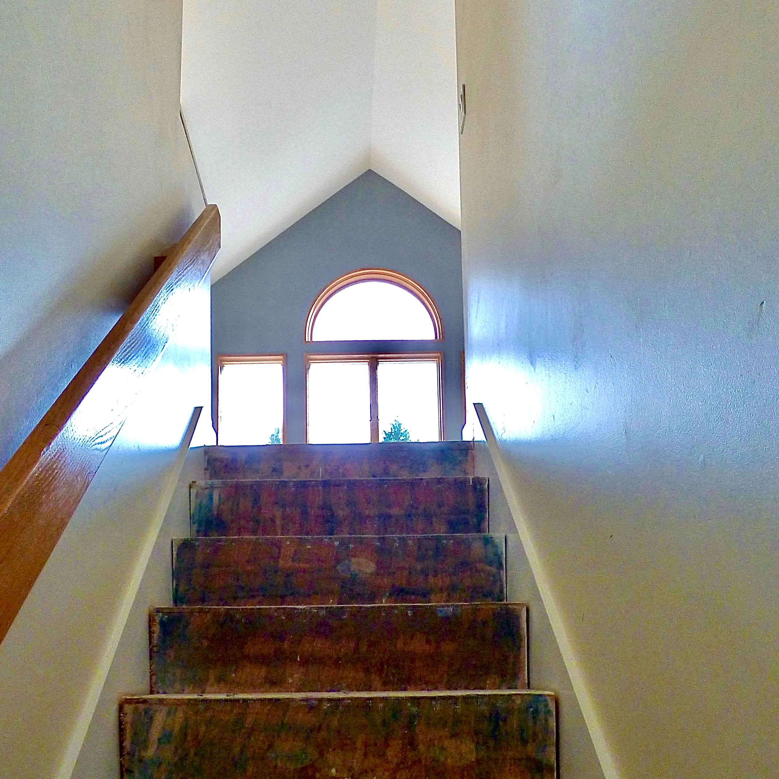 Looking up the stairs into one of the ensemble rooms. 
