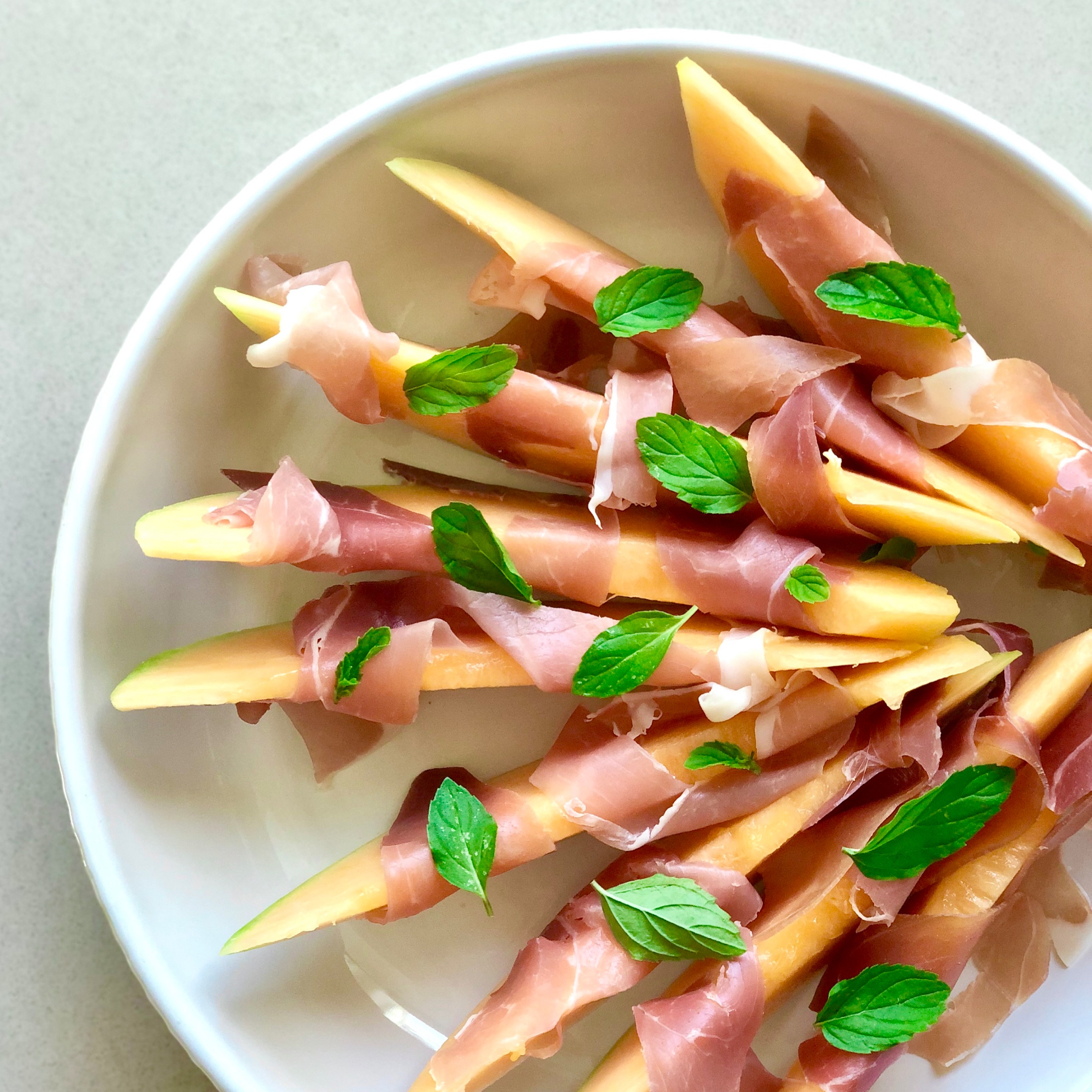 prosciutto and melon with mint