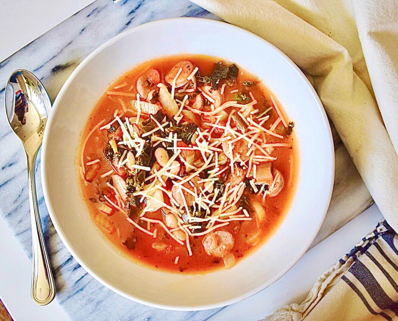 Tuscan style Tomato Soup with Kale, White Beans & Sausage